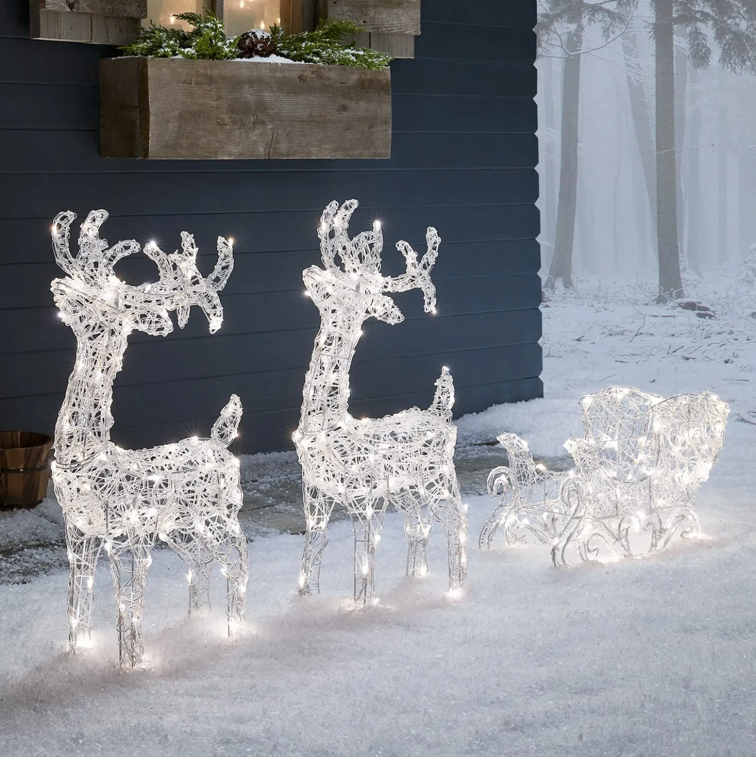 Bicolor LED-Rentiere mit Schlitten Swinsty