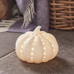 Deko Kürbisse in neutralen Farben mit Truglow® LED Kerzen Trio