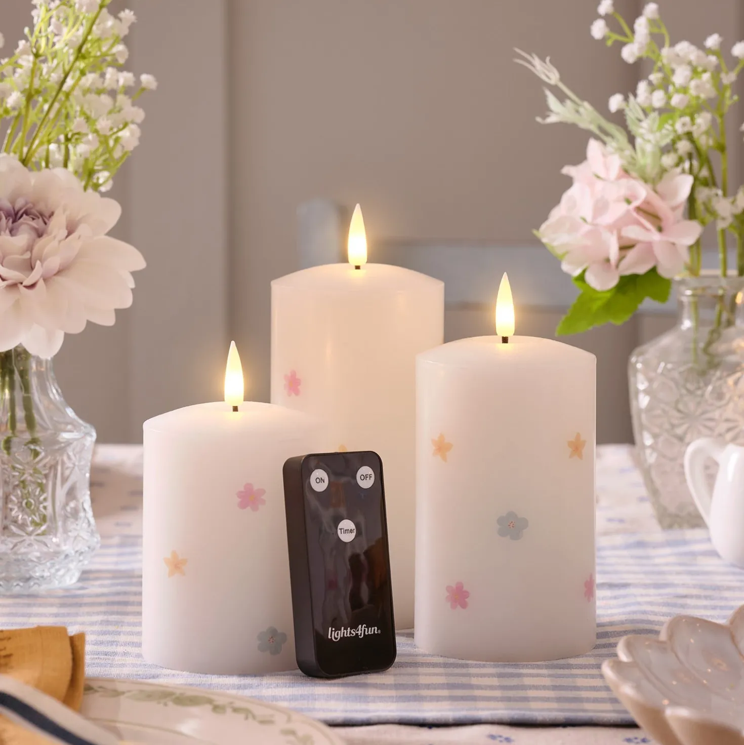 3er Set TruGlow® LED-Kerzen mit Blumen & Fernbedienung