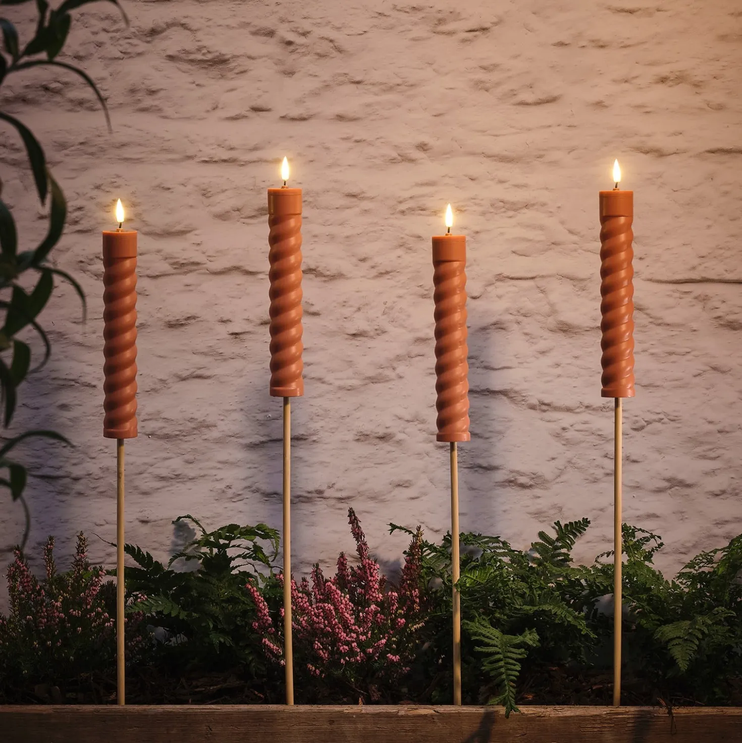 4er Set TruGlow® Solar Stabkerzen terracottafarben