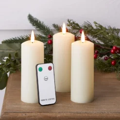 Schmales TruGlow® LED-Kerzen Trio aus Echtwachs mit Fernbedienung